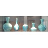 Five turquoise Chinese vases 12cm to 24cm, three with neck repairs. (5)