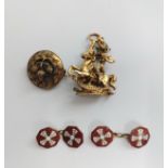 A Victorian locket back brooch, a pair of enamel on metal cuff links, a gilded metal brooch of