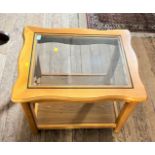 A Modern Glass top Coffee table. 47cm x 63cm x 52cm.