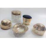 A miscellaneous collection of silver including silver mounted pin cushion, silver topped toilet jar,