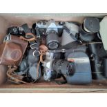 Assorted cameras including Canon and Asahi Pentax, lenses in cases.