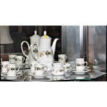 A Royal Doulton larchmont coffee service comprising coffee pot and lid, milk jug, sugar bowl, six