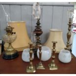 A Brass oil lamp 58cm, two brass lamp bases, small lamp, three brass candlesticks and three glass