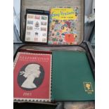 A collection of British and World stamps contained in two small suitcases.