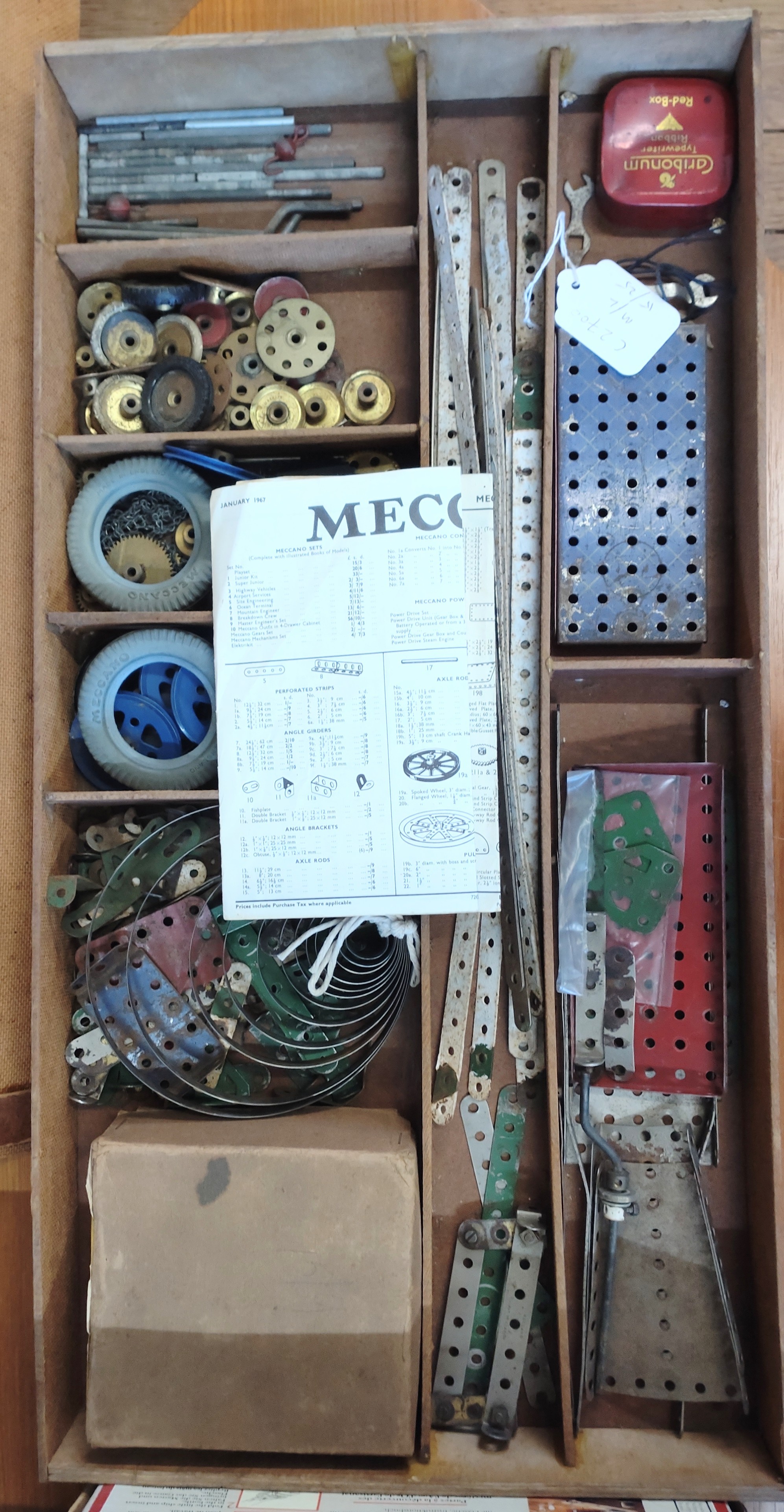 Meccano pre and post war components and wheels, two keys, a xylophone and an incomplete Ship-in a-