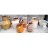 Stoneware kitchen utility jugs and jelly mould. (9)
