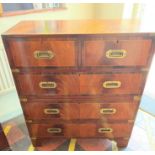 A Mahogany Brass Bound Campaign Chest. 19th/20th century. With side carrying handles. Fitted