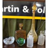 A Murano glass faceted bowl 14cm, two amber glass bottles with stoppers, pair of decanters and an