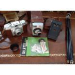 A selection of vintage cameras; Silette Prontor SVS camera with leather case and with an instruction