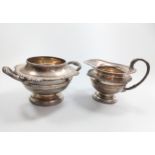 A part silver tea set: a cream jug, a two-handled sugar bowl but no teapot. Sheffield 1937