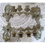 Two Four Light Victorian Brass Candle Wall appliques. Circa 1840. cast with leafage.