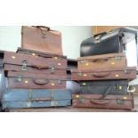 10 vintage leather suitcases and briefcases.