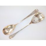 A pair of Mappin & Webb silver serving spoons for serving cake. With pierced decoration .