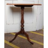 A Victorian Tripod table. With rectangular top.
