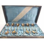 A Cased Set of 10 German 800 Silver Coffee Spoons with hoof finials.