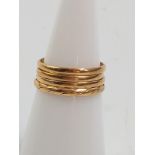 Four very thin and small gold rings, three marked for 18ct gold, one hard to see. Sizes H-J