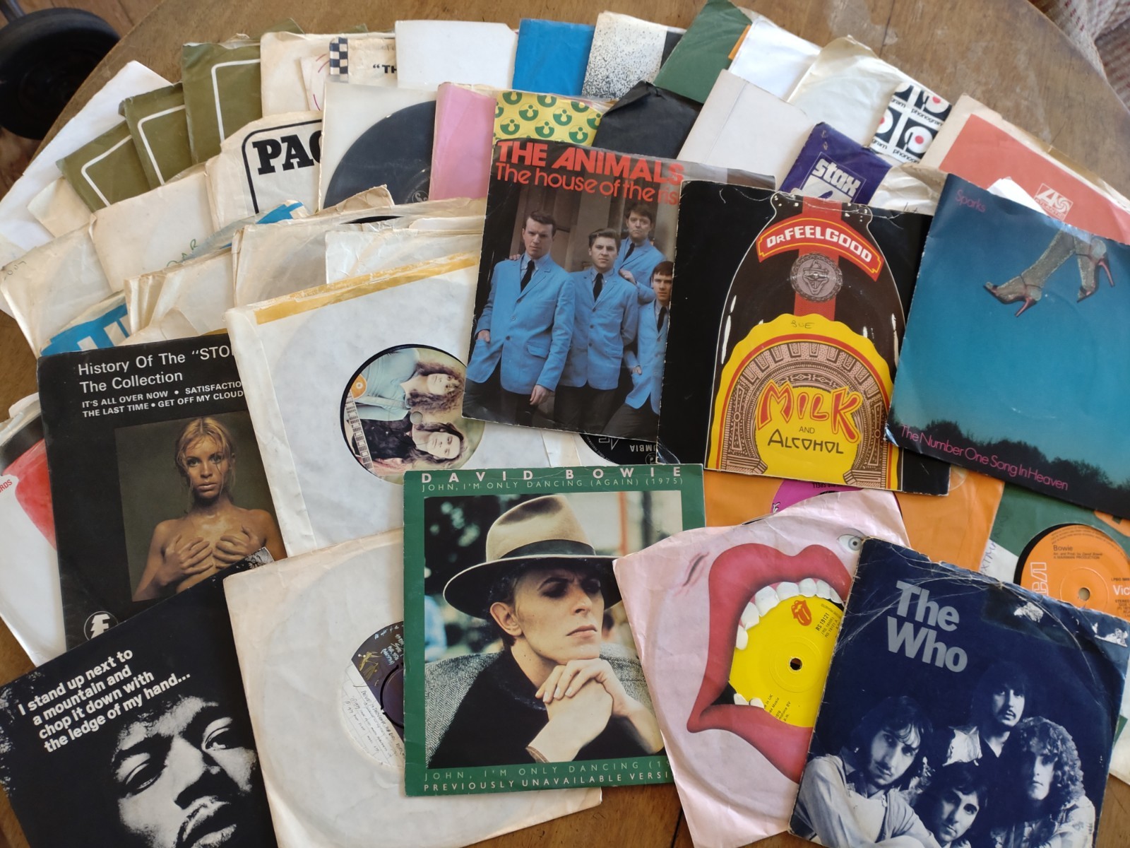 A collection of 7" singles from the 60's and 70's, including: Free “Sail On” & “Wishing Well”, Wings