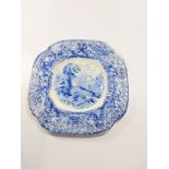A blue and white ironstone cake plate.