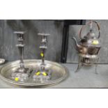 A pair of plated candlesticks, a kettle and burner, and a tray.