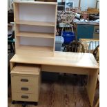 A home office desk (75cm x 136cm x 60cm), filing cabinet (60cm x 43cm x 60cm) and bookshelf which is