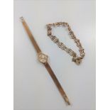 A ladies 9ct gold wristwatch and a 9ct gold gate bracelet.