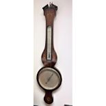 A George III mahogany mercury barometer. Circa 1790. With conch shell Paterae decoration.