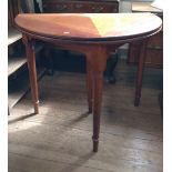 A demi lune card table