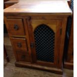 A drawer unit. Indian Rosewood. Three drawers with iron ring handles and storage space via a door