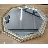 An octagonal mirror, 20th century. 70cm x 70cm.