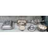 Six pieces of silver plate including an entree dish, a candlestick, etc.