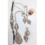 A marcasite pendant, chain and a pair of matching earrings. A 1930's ladies marcasite wristwatch,