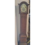 A vintage oak grandmother clock. With mechanical movement.