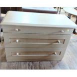 A large modern chest of drawers. Three drawers. Toip needs some repair. 72cm x 105cm x 54cm.