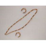 A 9ct gold neck chain, a thin gold metal chain and a pair of 9ct gold earrings (24.3gms).
