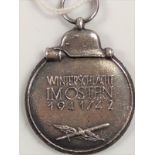 A German Medal called the Eastern Medal officially the Winter Battle in the East. 1914-1942.