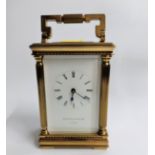 A Mappin and Webb, London Brass carriage time piece. 20th century.