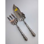 A pair of silver cake servers