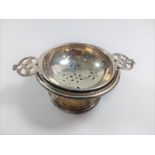 Silver Birmingham 1926 tea strainer and matching stand/ drop bowl