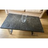Coffee table (in two parts) chrome legs and heavy top. 46cm x 130cm x 80cm.