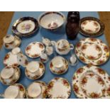 Royal Albert Country Roses tea set, a cut glass maroon overlay vase 25.5cm, and various plates. (31)