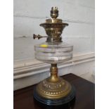 A brass and glass oil lamp converted to electric. 37cm.