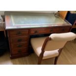 A reproduction mahogany Pedestal Desk. late 20th century. With leather inset top. 71cm x 120 cm 60cm