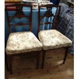 A pair of dining chairs