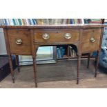 A George III mahogany Sideboard. Circa 1800. Fitted with a drawer flanked by a cabinet each side.