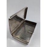 A silver colour metal box 12 x 7 x 1.5cm. Possibly Dutch, decorated to top bottom with bright cut