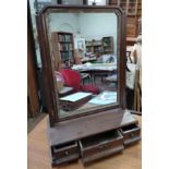 A George III mahogany Toilet Mirror. Fitted with three small drawers. 61cm x 37cm x 19cm