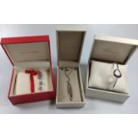 Three Kit Heath silver boxed jewellery items; one bangle, one bracelet and one necklace.