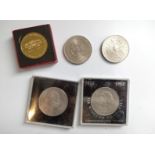 Five medallion coins