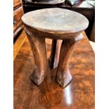 -A Karamojong Tribal Stool. Uganda. Circa 1950. The Karamojong tribe in northern Uganda has a