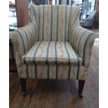 A Late Victorian/Edwardian Armchair. With Regency style silk upholstery.